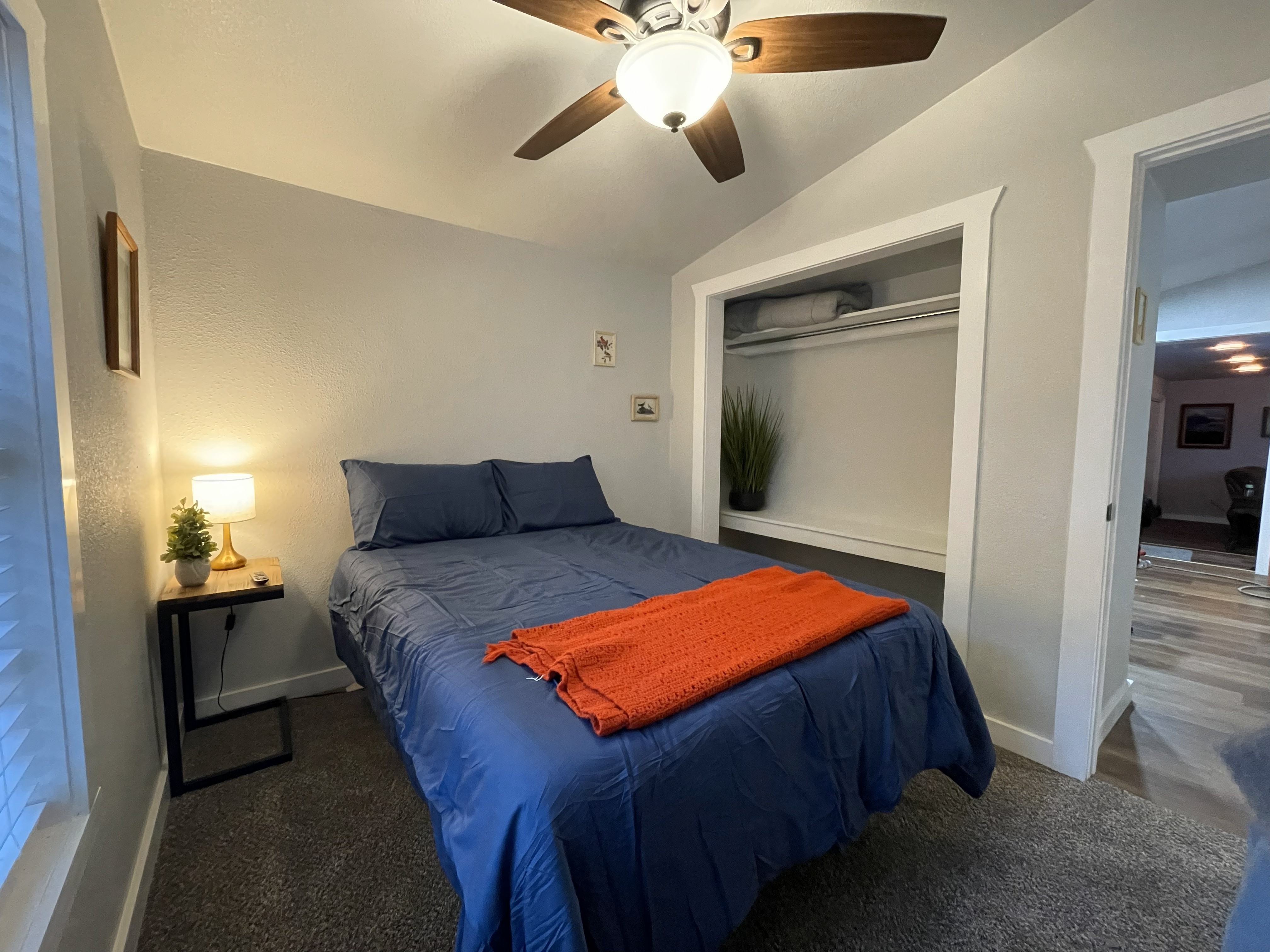 Downstairs bedroom with full bed